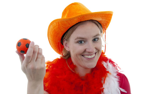 Portrait of female Dutch soccer fan in orange outfit over white backgroundの写真素材