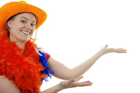 Dutch female soccer supporter is pointing over white backgroundの写真素材