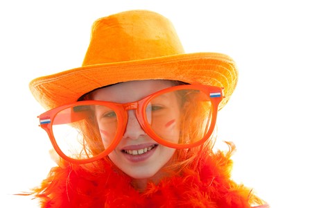 girl posing in orange outfit for soccer game or Dutch Queensday over white backgroundの写真素材