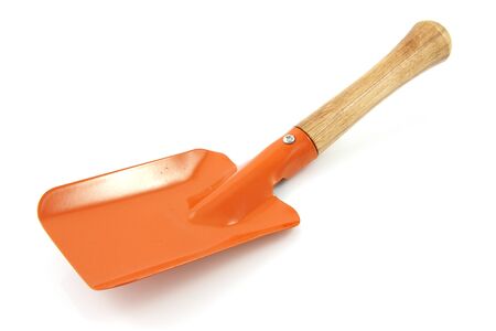 Garden tool; orange shovel isolated on white backgroundの写真素材