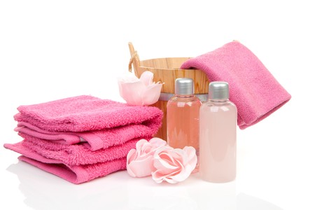 pink accessory for spa or sauna over white backgroundの写真素材