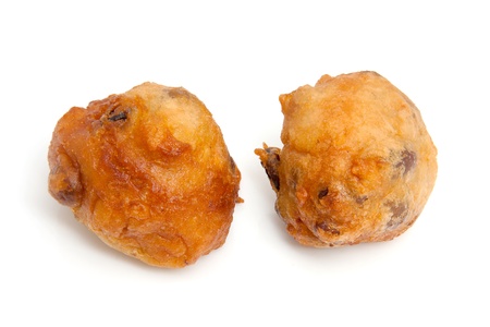 Two Dutch donut also known as oliebollen, traditional New Year's eve food isolated on white backgroundの写真素材