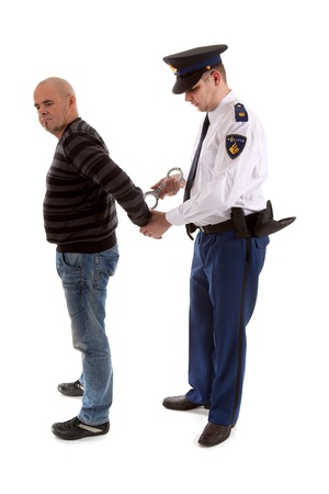 police agent is making a arrest over white backgroundの写真素材