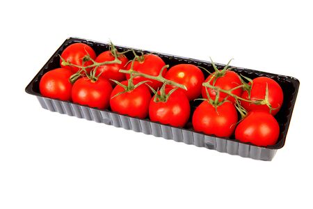 box with fresh tomatoes over white background 
の写真素材