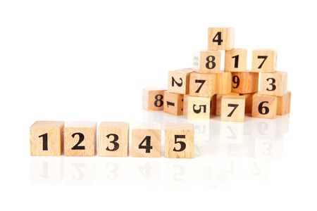 A lot of wooden blocks with numbers over white backgroundの写真素材