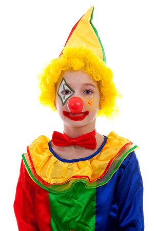 portrait of child dressed as colorful funny clown over white backgroundの写真素材