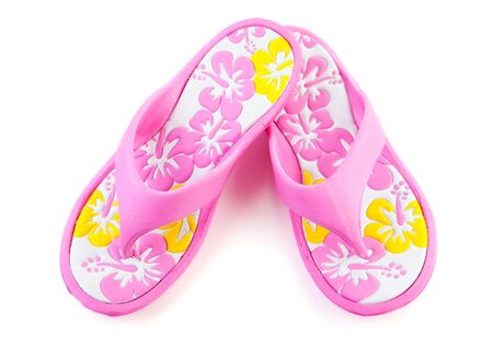 Pink summer slippers isolated on white backgroundの写真素材