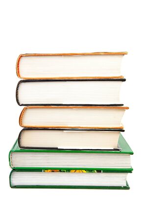 Six books stacked over white backgroundの写真素材