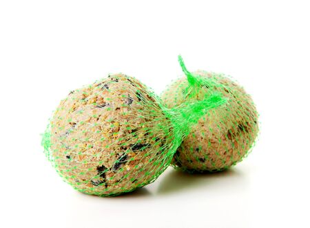 Fat balls; winter food for birds over white background 
の写真素材