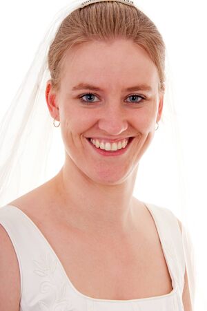 Young beautiful bride is posing over white backgroundの写真素材