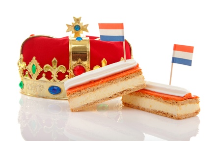Typical Dutch tompouce sweet with crown over white backgroundの写真素材