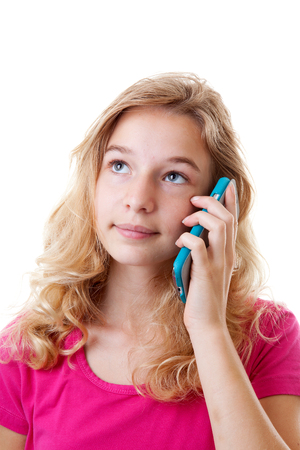 Girl is calling on mobile phone over white backgroundの写真素材