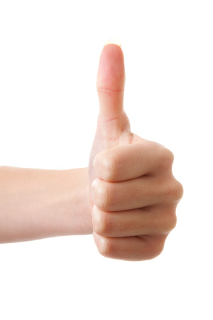 Hand with thumb up over white backgroundの写真素材