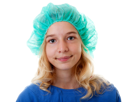 Girl is dressed for operation over white backgroundの写真素材