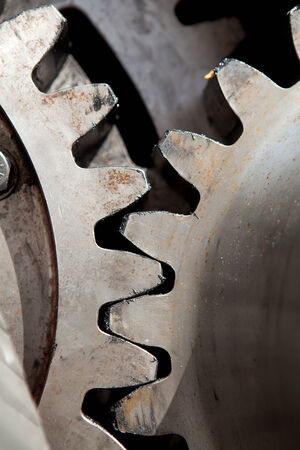 two metal gearwheels in closeupの写真素材