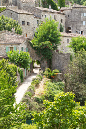 Street view with hatch in Balazuc, a beautiful town in Franceの写真素材