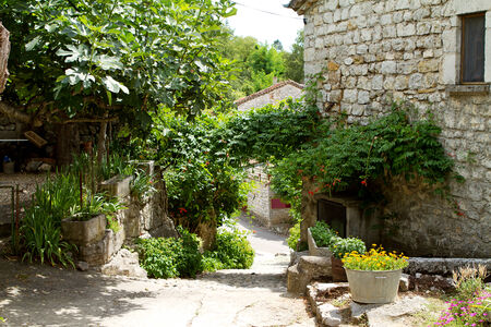 Street view with hatch in Balazuc, a beautiful town in Franceの写真素材