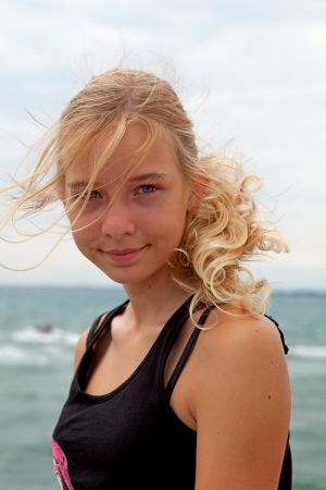 Portrait of teenage girl at the beach in closeupの写真素材