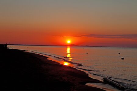 Sunrise above the oceanの写真素材