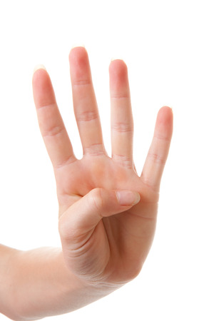 Hand is counting number 4 over white backgroundの写真素材