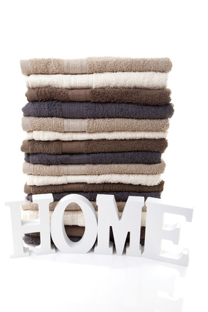 Pile of towels over white backgroundの写真素材
