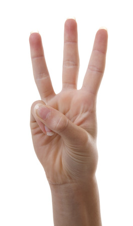 Hand is counting number 3 over white backgroundの写真素材