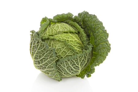 fresh green cabbage over white backgroundの写真素材