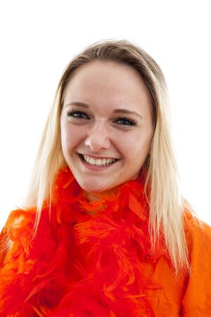 Young woman as Dutch orange supporter over whiwte backgroundの写真素材