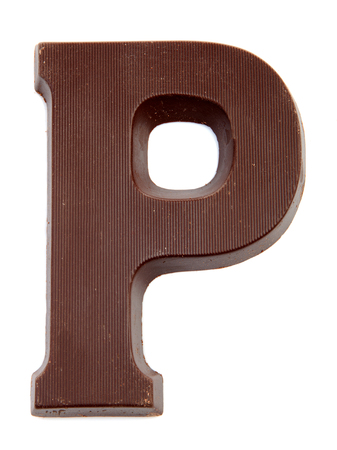 Chocolate letter P for Sinterklaas, event in the Dutch in december over white backgroundの写真素材