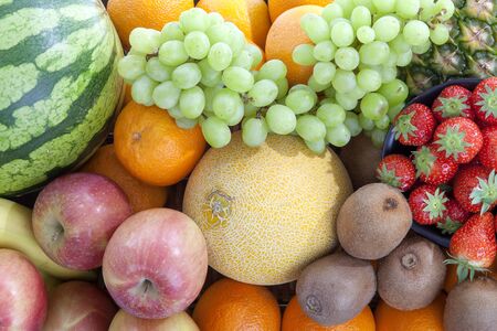 Wallpaper filled with fresh fruit in close upの写真素材