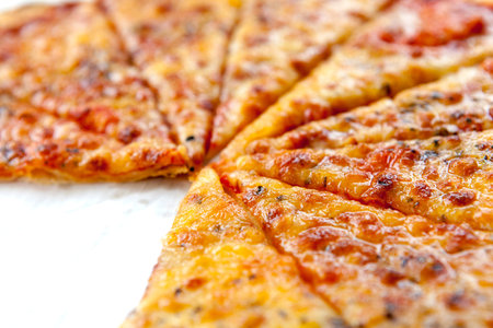 Slices of pizza in closeupの写真素材