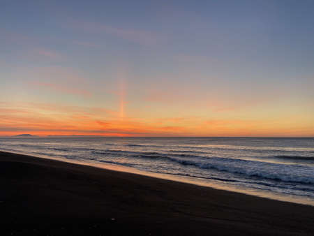 The Pacific ocean in the sunriseの写真素材