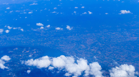 Blue sky and Clouds looking from the Airplaneの写真素材