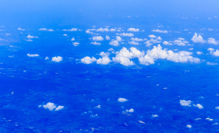 Blue sky and Clouds looking from the Airplaneの写真素材