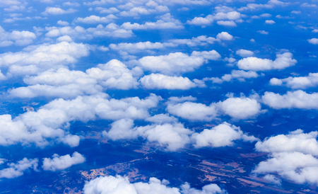 Blue sky and Clouds looking from the Airplaneの写真素材