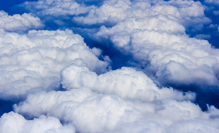 Blue sky and Clouds looking from the Airplaneの写真素材