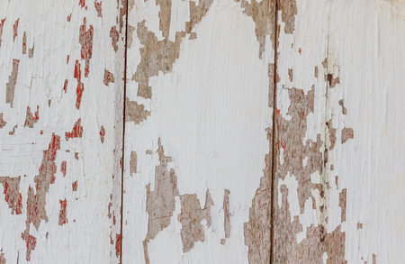 Old wooden painted and chipping paint textureの写真素材
