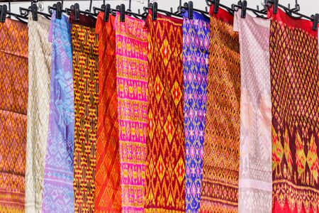 Beautiful Thai dresses  on the railの写真素材