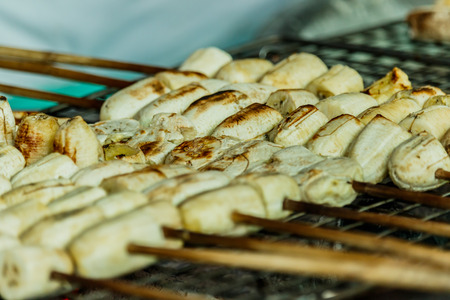 Grilled bananas for dessert being grilled on the rackの写真素材