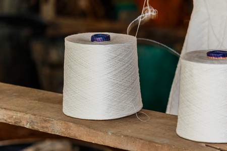 The equipment used in the production of traditional hand woven cotton in  Thailand.の写真素材