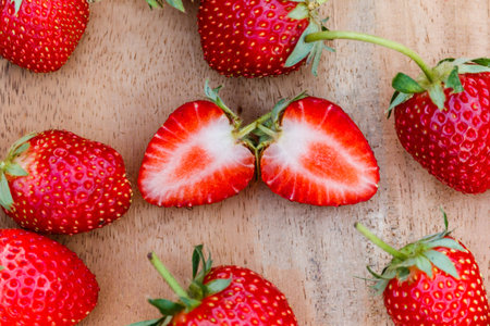 red close up strawberries with selective focus on a strawberry with many strawberries