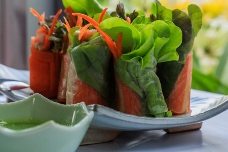 Fresh spring rolls with fresh vegetable served with  salad cream dipping sauce.の写真素材