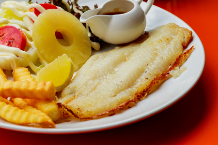 Deep Fried Dolly Fish Steak with French fries.の写真素材