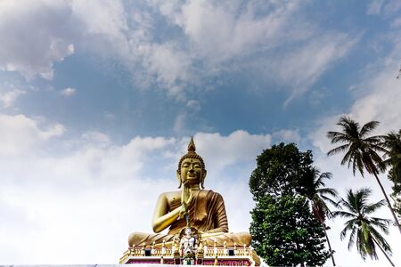 Big Golden Buddha statue in Thailand templeの写真素材