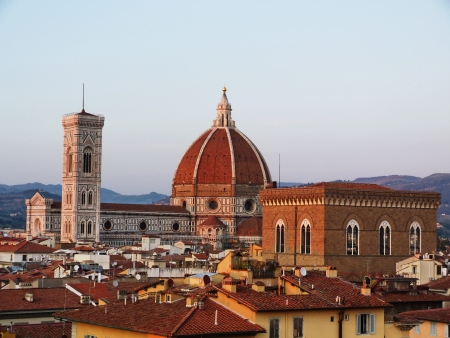 Cathedral of Florence and church of Orsanmichele at sunset, Florence, Italyの写真素材