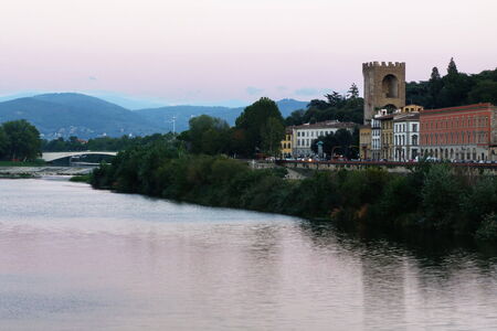 Sunset over the river Arno in Florence, Italyの写真素材