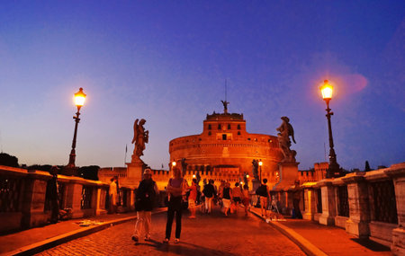 Saint Angel Castle at sunset with the sant angelo bridge, Rome, Italy