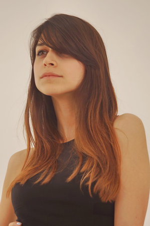 Portrait of a young model with brown hair
