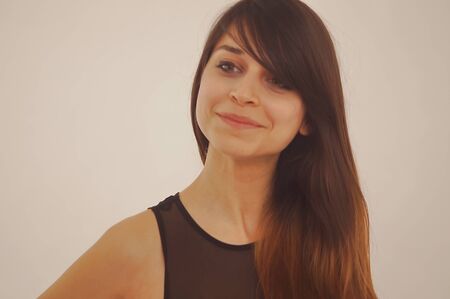 Portrait of a young model with brown hairの写真素材