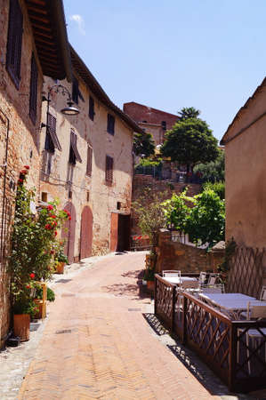Typical street of the ancient medieval village of Certaldo, Tuscany, Italのeditorial素材